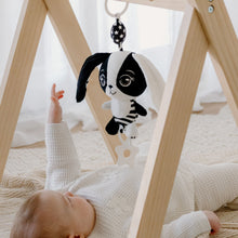Load image into Gallery viewer, Billie the Bunny hanging baby toy attached to wooden baby play gym for sensory development