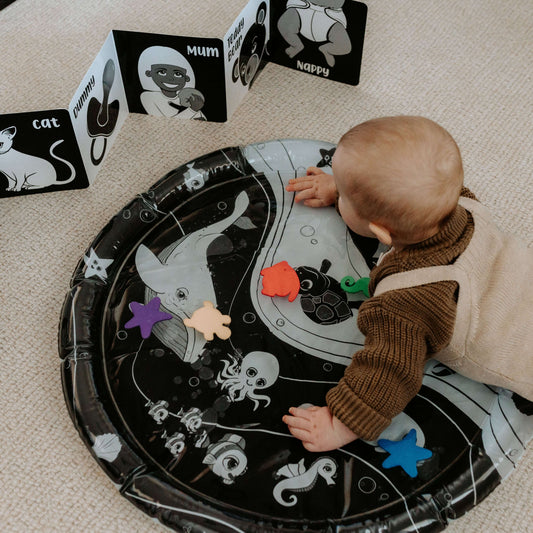 baby water mat, high contrast toy, black and white toy, black and white water mat, high contrast water mat, black and white baby toys, Young Wonderer, tummy time toy, black and white tummy time toy, young wonderer, young wonderer baby boutique, baby boutique australia, baby gifts australia, baby gift ideas, baby gift, tummy time play, tummy time toys, black and white baby toys australia