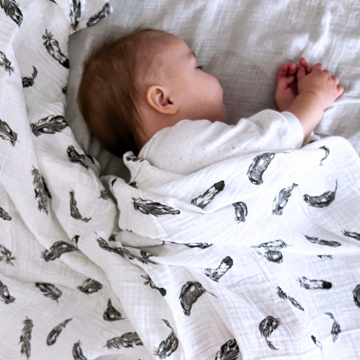 black and white muslin, black and white baby muslin wrap, baby muslin wrap, baby muslin australia, baby wrap australia, feather muslin, zebra muslin, panda muslin, snowflake muslin, winter muslin wrap, winter baby wrap, high contrast wrap, high contrast baby, high contrast muslin, Young wonderer, young wonderer baby boutique, newborn baby gift, baby gift, baby shower gift, baby boutique, baby boutique australia, baby gift australia,muslin australia, baby wrap australia