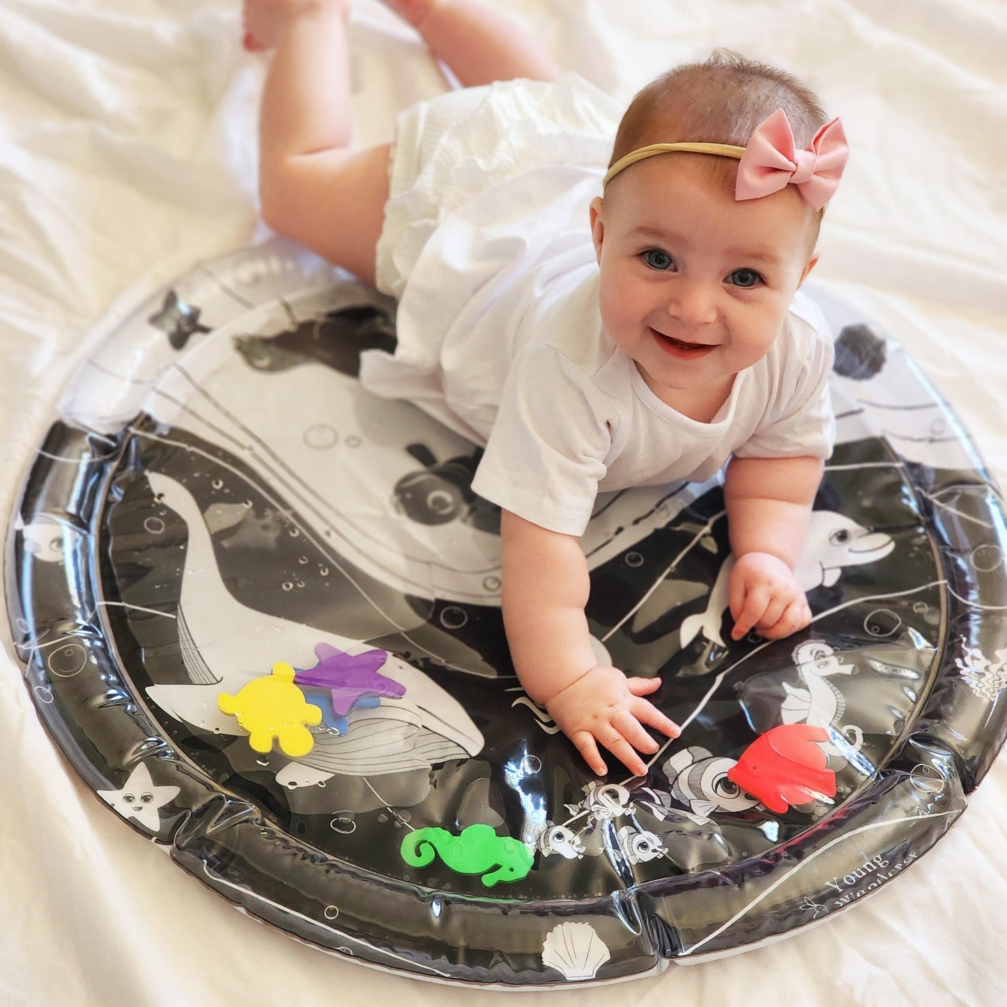 baby water mat, high contrast toy, black and white toy, black and white water mat, high contrast water mat, black and white baby toys, Young Wonderer, tummy time toy, black and white tummy time toy, young wonderer, young wonderer baby boutique, baby boutique australia, baby gifts australia, baby gift ideas, baby gift, tummy time play, tummy time toys, black and white baby toys australia